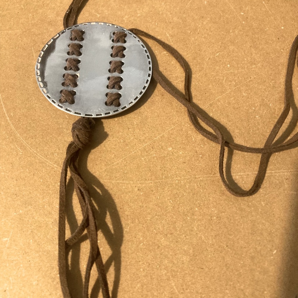 Clio Bleu silver plated pendant on suede strap. By Reminiscence made in France